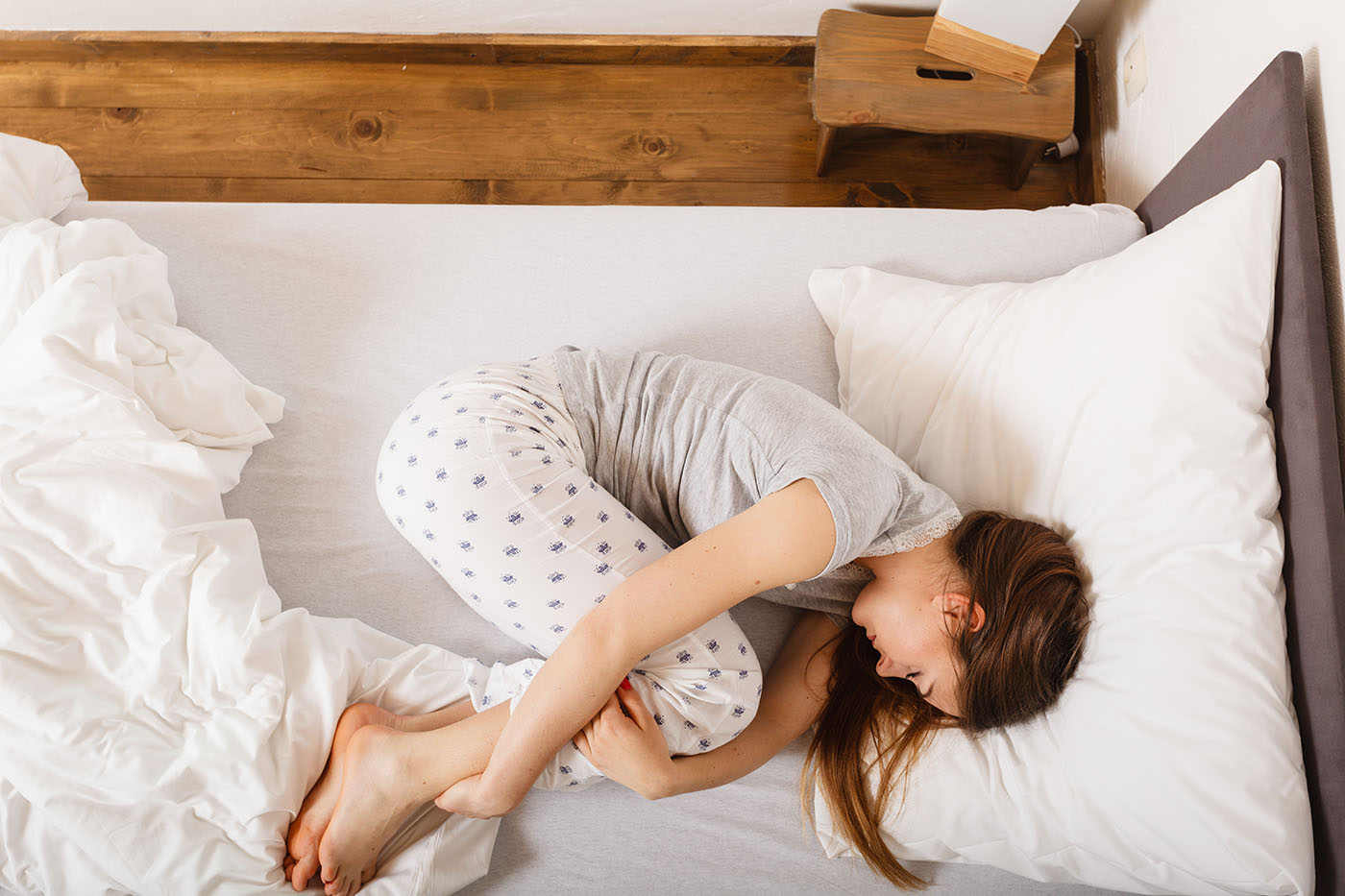 pozițiile de somn ajută la pierderea în greutate